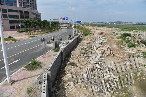 洛江治理堤后路海漂垃圾 筑起围墙防垃圾车偷倒